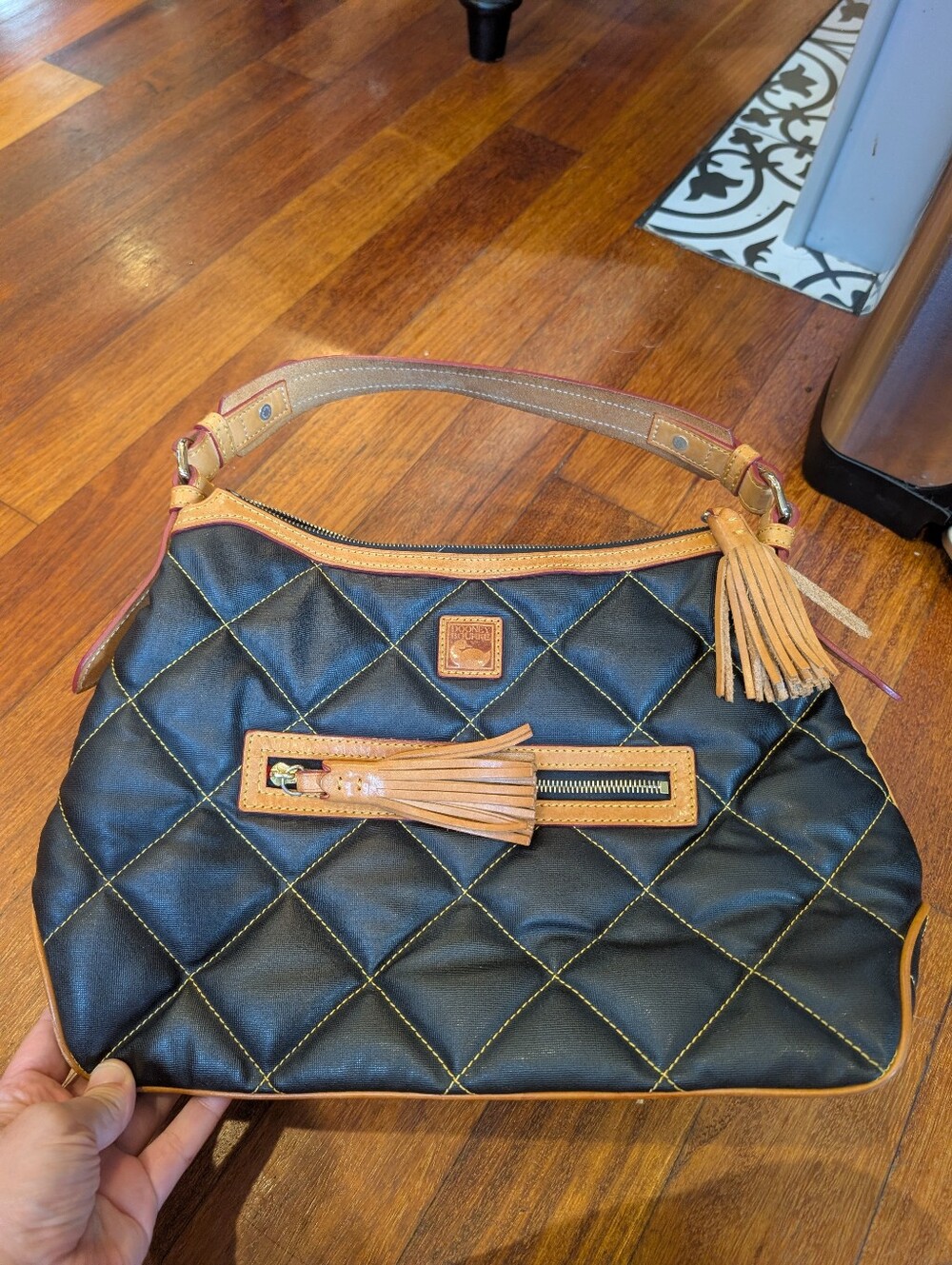 Dooney & Bourke Black Quilted Shoulder Bag with Tan Trim and Tassels